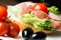 Ham sandwich with tomato and olive close up Royalty Free Stock Photo