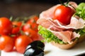 Ham sandwich with tomato and olive closeup Royalty Free Stock Photo