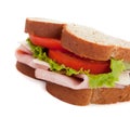 A ham sandwich on wheat on a white background Royalty Free Stock Photo