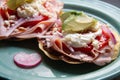 Ham tostadas with cheese and avocado. Mexican food Royalty Free Stock Photo