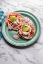 Ham tostadas with cheese and avocado. Mexican food Royalty Free Stock Photo