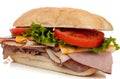 Ham and turkey sandwich on a hoagie bun on white Royalty Free Stock Photo
