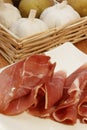 ham on a white plate with fork and knife Royalty Free Stock Photo