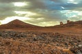 Hamada du Draa, moroccan stone desert in foreground, mountains in background, Morocco Royalty Free Stock Photo