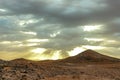 Hamada du Draa, moroccan stone desert in foreground, mountains in background, Morocco Royalty Free Stock Photo