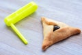 Hamantaschen cookie and graggers for Purim Jewish Holiday