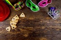 Hamantaschen cookies or hamans ears and mask for Purim celebration jewish carnival holiday Royalty Free Stock Photo