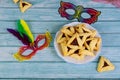 Hamantashen jewish cookies with masks for carnival