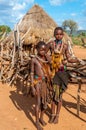 Hamar girls in front of their house.