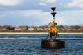 The hamble point south cardinal marker floating in the solent Royalty Free Stock Photo