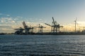 Hamburg container port with some ships loading and cranes