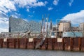 Hamburg Germany-August 29 2015: Elbphilharmonie behind industriy plant Royalty Free Stock Photo