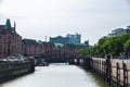 Old warehouses next to a canal in HafenCity, Hamburg, Germany Royalty Free Stock Photo