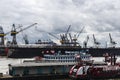 Port with cranes and cruise ships in Hamburg, Germany Royalty Free Stock Photo