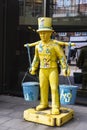 Yellow human figure with top hat in Hamburg, Germany