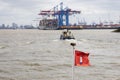 Hamburg, Germany - 5-3-2022: Flag on the bow of a ferry ship in the port of Hamburg