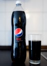 Hamburg, Germany 01.18.2018 illustrative editorial of PET bottle of Pepsi Max with filled drinking glass