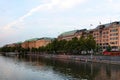 Hamburg cityscape at Binnenalster in summer evening. People relaxing by lake