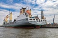 Hamburg, Germany - July 25, 2022, Alster - Port with shipyards, cranes, logistic facilities and messengers from Hamburg in Germany Royalty Free Stock Photo