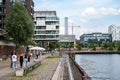 Hamburg, Germany - People walking at the Kaiserkai or Emperor Docks in the Hafencity Royalty Free Stock Photo