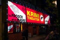 Hamburg, Germany - June 23, 2018: The Krimi Theater at night showing an old German movie on the Reeperbahn.