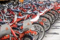 Hamburg, Germany, June 6., 2018: A lot of red rental bikes with red frames and black saddles, deliberately low depth of field