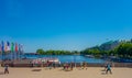 HAMBURG, GERMANY - JUNE 08, 2015: People walking on a pier, looking the nice day on Hamburg. Boats on the river