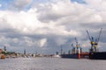 Hamburg, Germany - June 30, 2014: View at shipyard Blohm + Voss and touristic part of Port of Hamburg, Speicherstadt and Hafencity