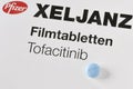 One pack of the Pfizer drug Xeljanz 10mg. On the package is a blue Pill. editorial use only