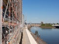 Hamburg, Germany - May 04, 2018: View from in Hafencity, Hamburg eastwards at building with scaffolding and Baakenpark. Royalty Free Stock Photo