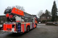 Modern fire truck. Fire truck with articulated turntable ladder, additional rear wheel steering, swi Royalty Free Stock Photo