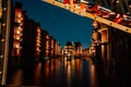 Hamburg, Germany. View of Wandrahmsfleet at dusk in light illumination. Located in Warehouse District -Speicherstadt