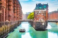 Hamburg Speicherstadt with sightseeing tour boat in summer, Germany Royalty Free Stock Photo