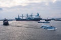 Hamburg. View of the city port with ships and docks, cargo cranes and warehouses Royalty Free Stock Photo