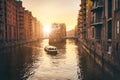 Hamburg warehouse district in golgen hour sunset lit. Water castle palace and tourist visting boat trip in river. Old Royalty Free Stock Photo
