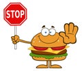 Hamburger Cartoon Character Holding A Stop Sign