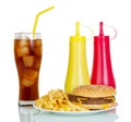 Hamburger, french fries, glass cola and sauces isolated on white. Royalty Free Stock Photo