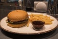 hamburger with french fries and sauce