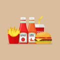 Hamburger french fries and soda with tomato and spicy sauce Royalty Free Stock Photo