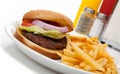 Hamburger and fries with a diner set-up Royalty Free Stock Photo