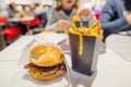 hamburger and fries ration close-up in a fast food restaurant