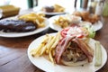 Hamburger with fries and salad