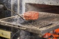 Hamburger grilled on a barbecue. Outdoor cooking. beef burger