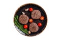 Hamburger grilled meat cutlets patties with herbs. Isolated, white background. Top view.