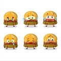 Hamburger gummy candy cartoon character with sad expression Royalty Free Stock Photo