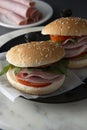 Hamburger with ham. Two burgers, hoemmade food. healthy sandwich with fresh vegetables Royalty Free Stock Photo