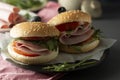 Hamburger with ham. Two burgers, hoemmade food. healthy sandwich with fresh vegetables Royalty Free Stock Photo