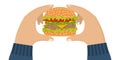 Hamburger holding in hand