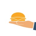 Hamburger holding in hand silhouette