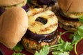 Teriyaki Turkey Burger with Grilled Pineapple and Red Onion Royalty Free Stock Photo